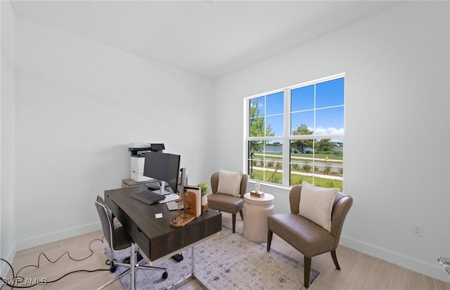 42202 Lake Timber Dr, Punta Gorda, FL 33982 - office area featuring baseboards and light wood-style flooring