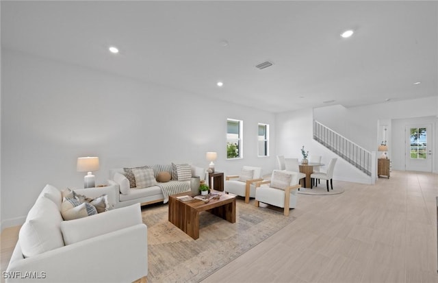 42202 Lake Timber Dr, Punta Gorda, FL 33982 - living area with recessed lighting and stairs