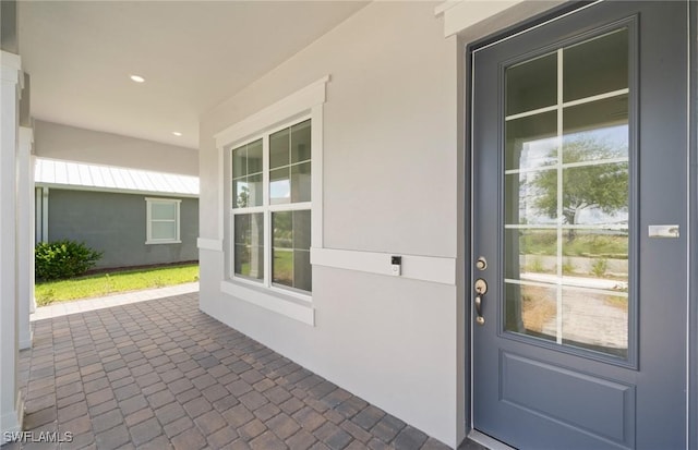 42202 Lake Timber Dr, Punta Gorda, FL 33982 - property entrance featuring stucco siding