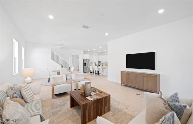 42202 Lake Timber Dr, Punta Gorda, FL 33982 - living area with recessed lighting and stairway