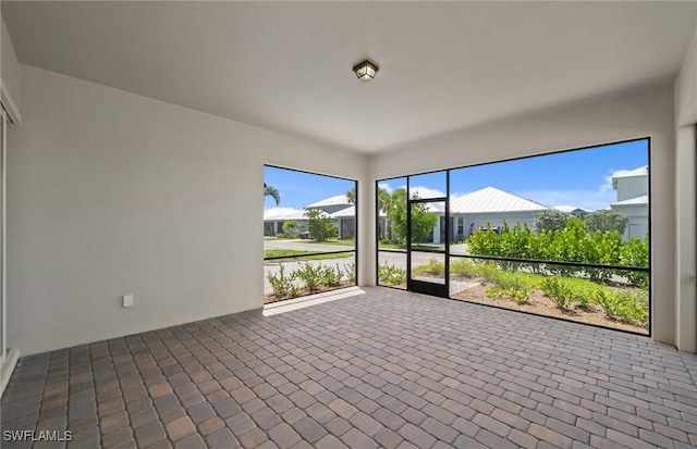 42202 Lake Timber Dr, Punta Gorda, FL 33982 - unfurnished sunroom with a residential view