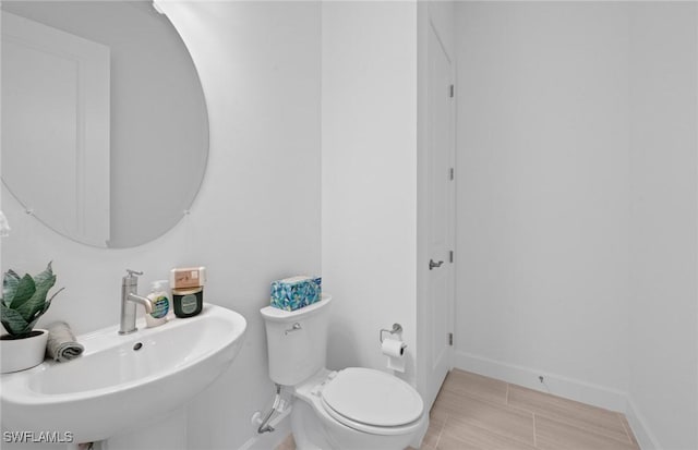 42202 Lake Timber Dr, Punta Gorda, FL 33982 - bathroom featuring a sink and toilet