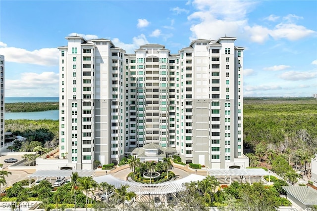 view of building exterior with a water view