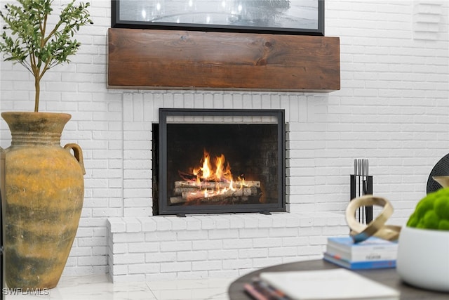 details with a brick fireplace