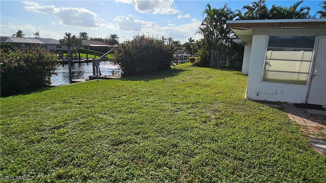 view of yard with a water view