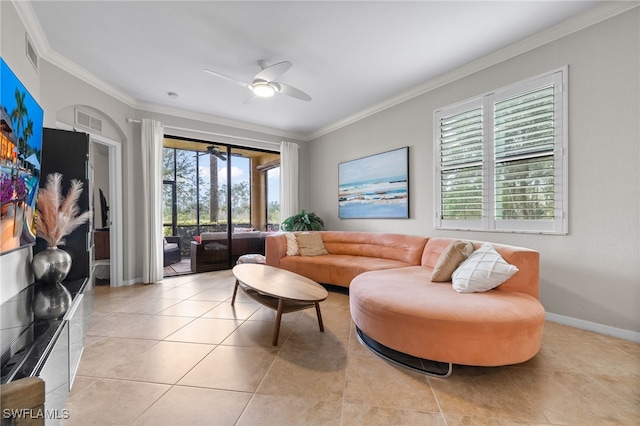 living room with ceiling fan, light tile patterned floors, and ornamental molding