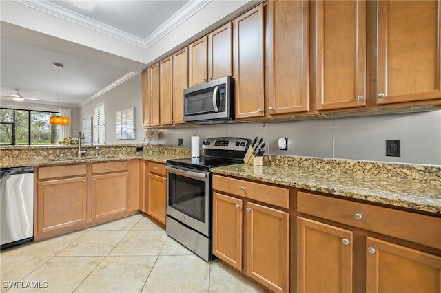 kitchen featuring crown molding, stainless steel appliances, light tile patterned floors, light stone countertops, and sink