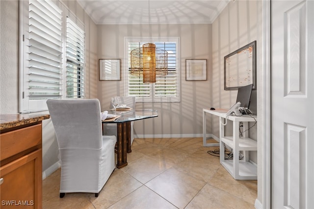 home office featuring light tile patterned floors, a healthy amount of sunlight, and crown molding