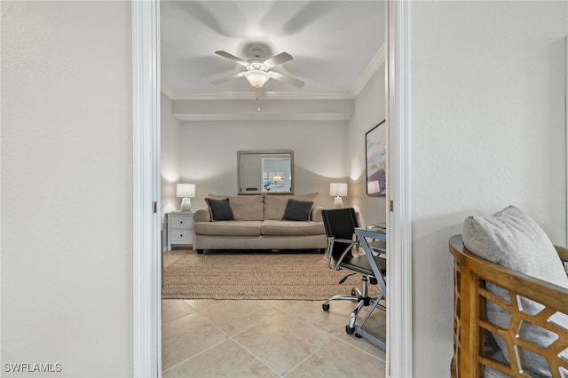 tiled office space featuring ceiling fan and ornamental molding