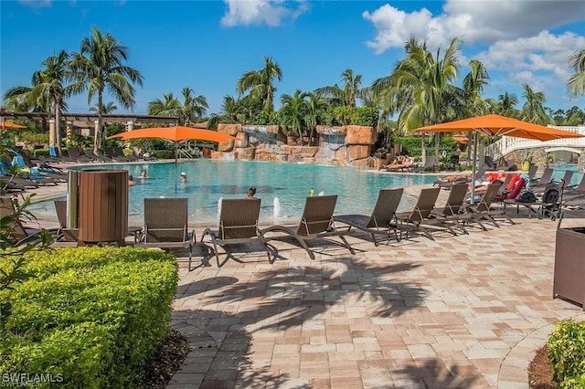 view of pool featuring pool water feature