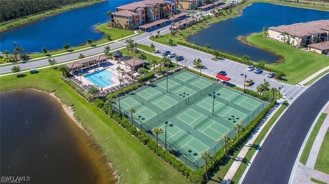 birds eye view of property featuring a water view