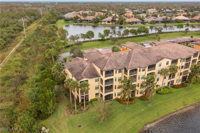 drone / aerial view with a water view