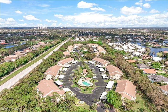 drone / aerial view with a water view