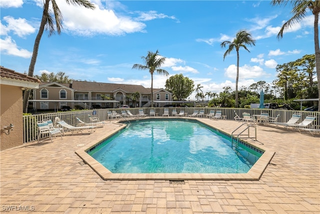 view of swimming pool featuring a patio