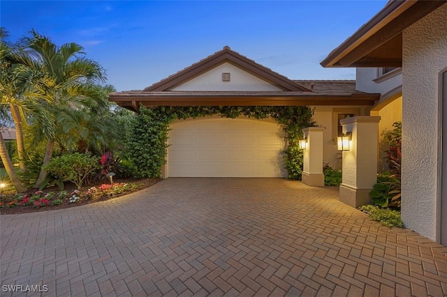 view of front of home featuring a garage