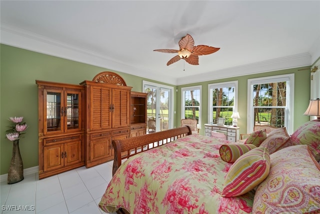 bedroom featuring ceiling fan, light tile patterned flooring, and ornamental molding