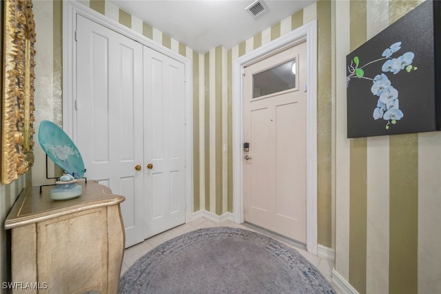 interior space with light tile patterned floors