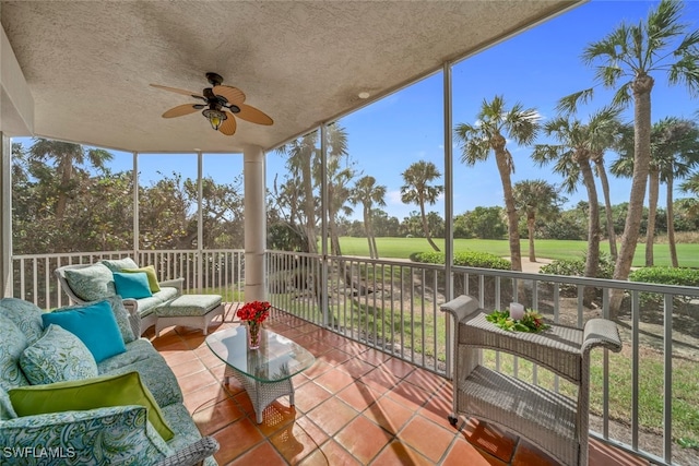 sunroom / solarium with ceiling fan