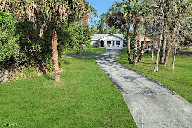 exterior space featuring a front yard