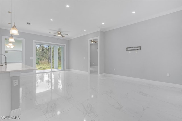 unfurnished living room with crown molding and ceiling fan