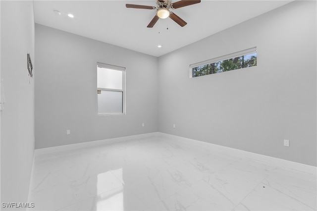 spare room featuring ceiling fan