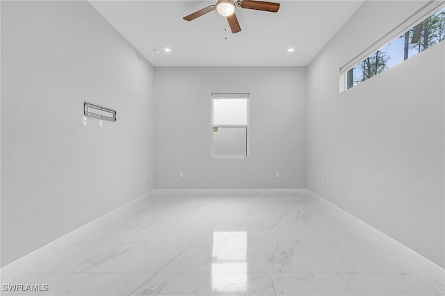 empty room featuring ceiling fan