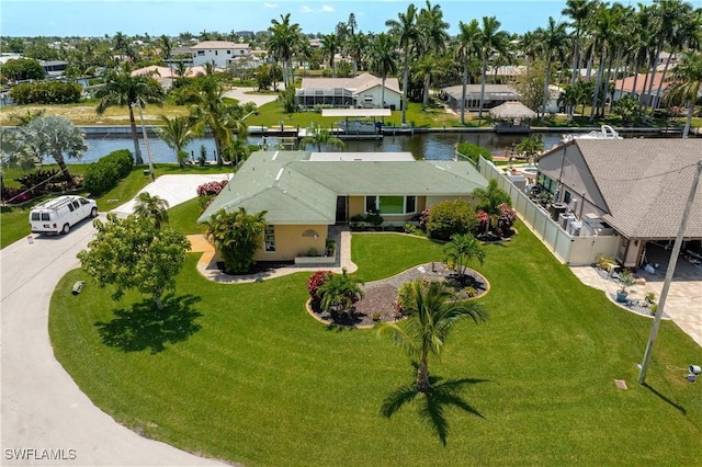 bird's eye view with a water view