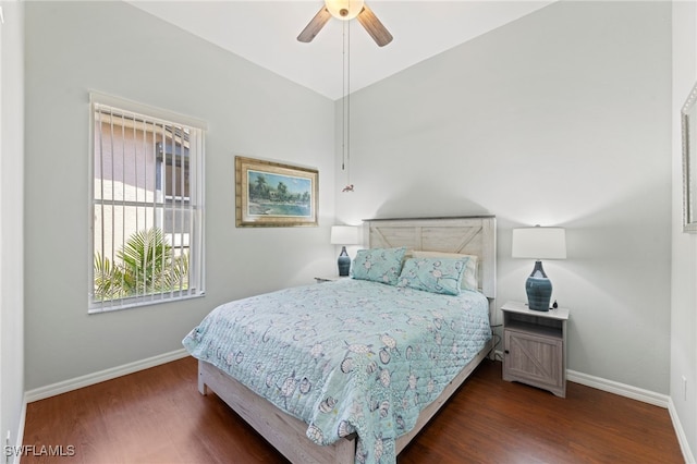 bedroom with dark wood-type flooring and ceiling fan