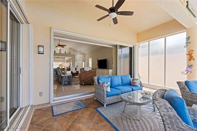 interior space with lofted ceiling and ceiling fan