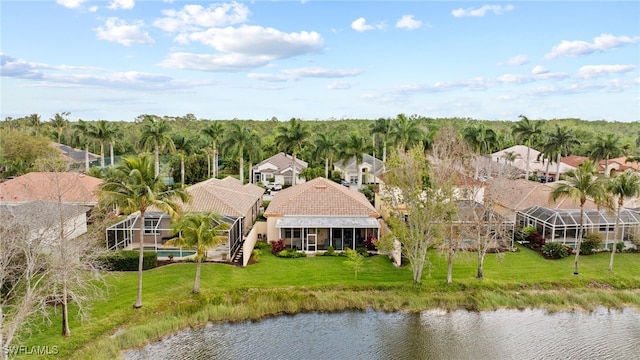 bird's eye view with a water view