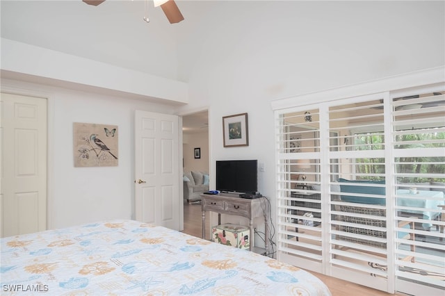 bedroom with hardwood / wood-style floors and ceiling fan