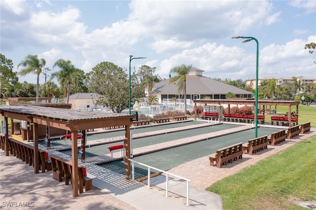 view of dock with a yard