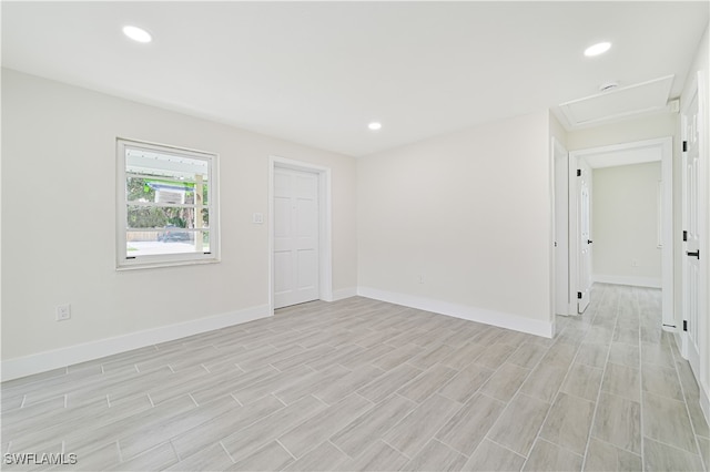 unfurnished room featuring light hardwood / wood-style flooring