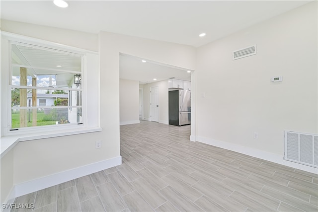 empty room featuring light wood-type flooring