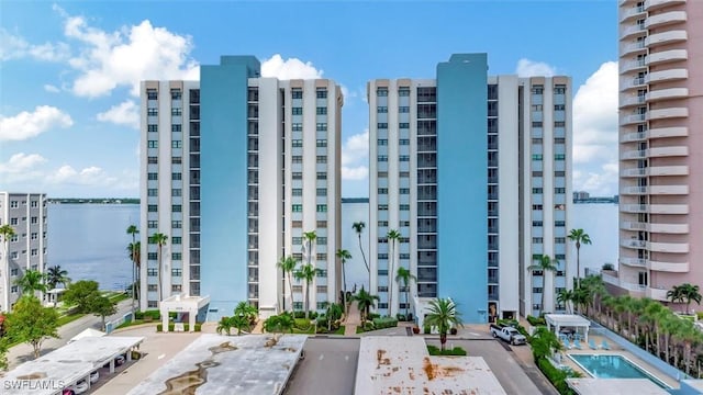 view of building exterior with a water view