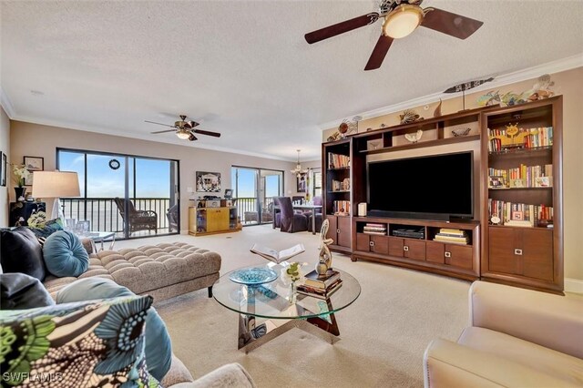 living room with crown molding and a textured ceiling