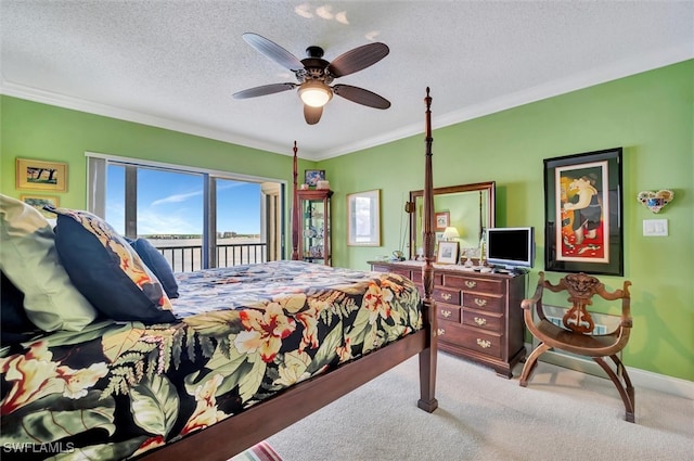 carpeted bedroom featuring ornamental molding, a textured ceiling, ceiling fan, and access to outside