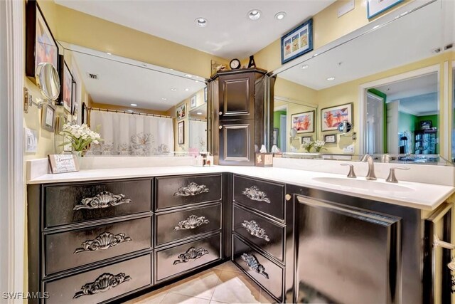 bathroom featuring vanity and tile patterned floors