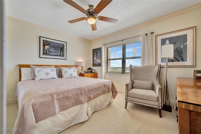 carpeted bedroom with crown molding, a textured ceiling, and ceiling fan