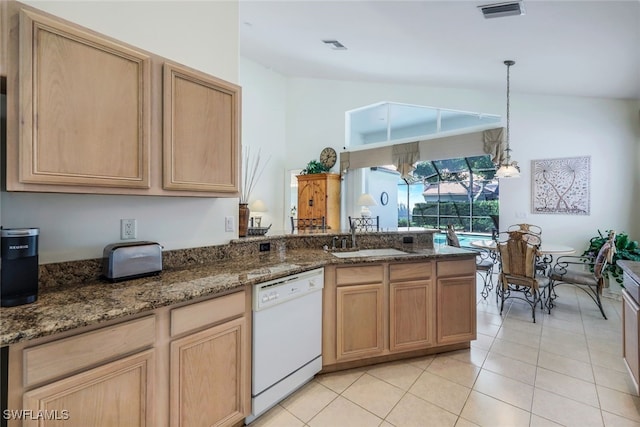 kitchen featuring sink, decorative light fixtures, light tile patterned floors, light brown cabinets, and white dishwasher