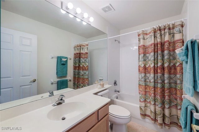 full bathroom with vanity, toilet, and shower / bath combo with shower curtain