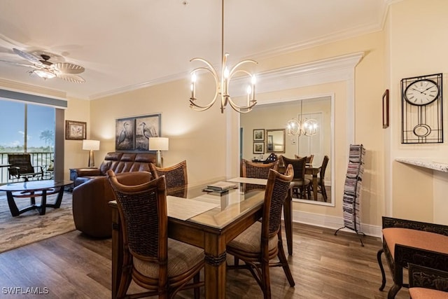 17100 Bridgestone Ct Unit 205, Fort Myers, FL 33908 - dining room with a chandelier, dark wood-type flooring, ornamental molding, a ceiling fan, and baseboards