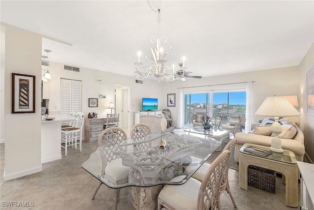 500 Saturn Ct Unit 68, Marco Island, FL 34145 - dining room with a chandelier and baseboards