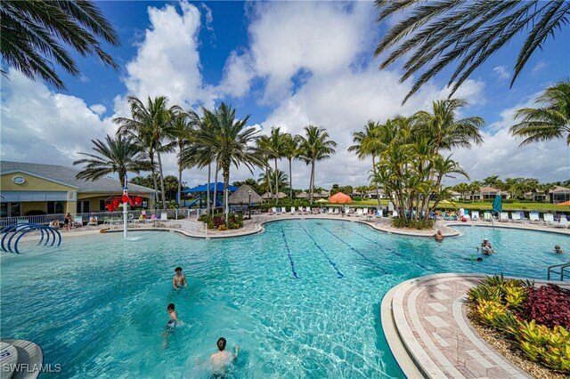 view of pool featuring a patio area and pool water feature