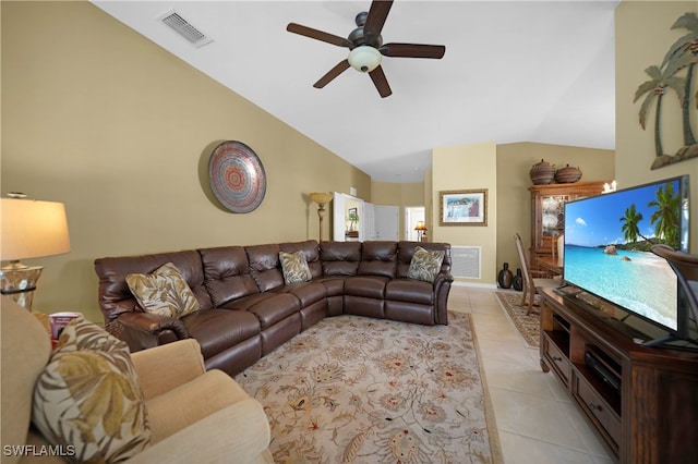 tiled living room with ceiling fan and lofted ceiling