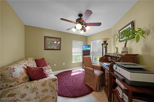 tiled office space with ceiling fan