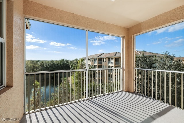 unfurnished sunroom featuring a healthy amount of sunlight