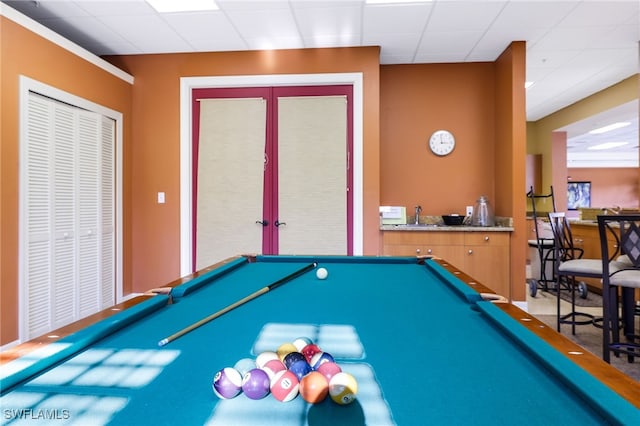 recreation room featuring a drop ceiling, pool table, and french doors