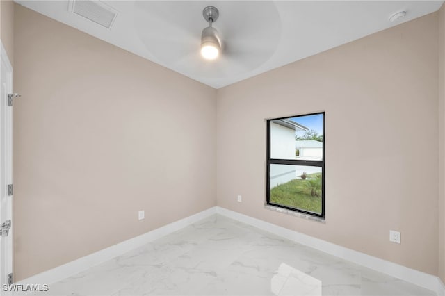 unfurnished room featuring ceiling fan