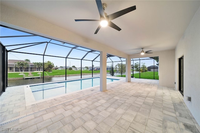 view of swimming pool with a water view, ceiling fan, a patio, a lanai, and a lawn